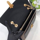 Side profile of statement refined women's handbag – women's designer-style accessory