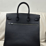 Close-up detail of statement bag design