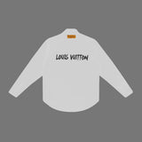 Close-up detail shot of Louis Vuitton luxury clothing with monogram-inspired silhouette