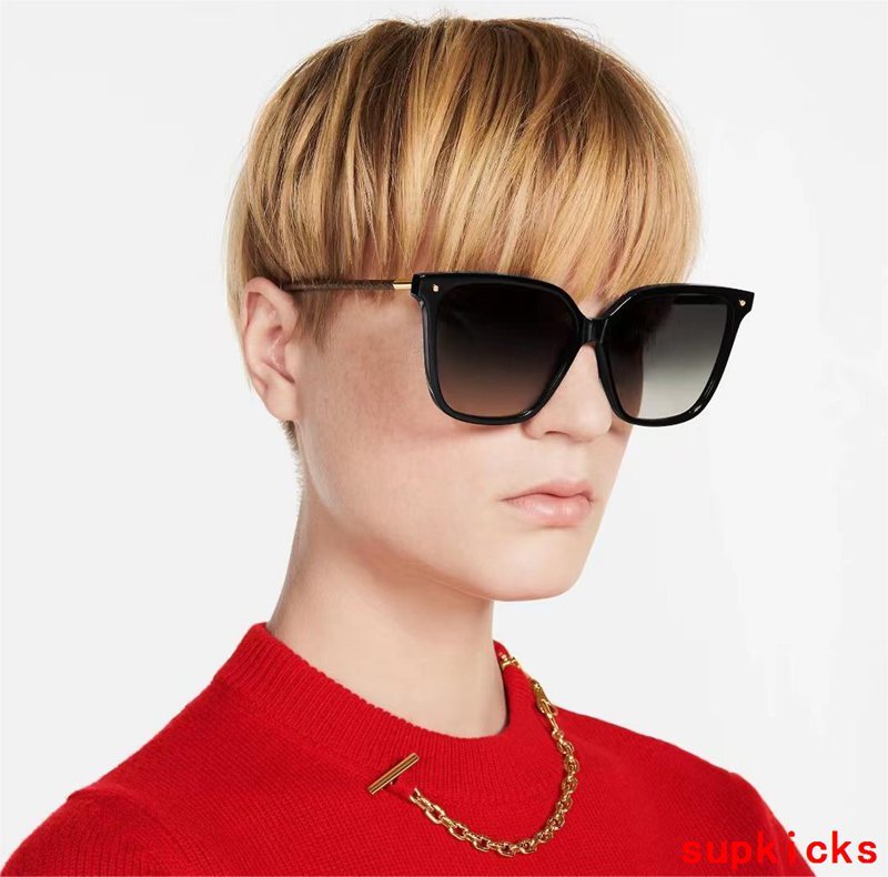 Close-up detail view of Louis Vuitton unisex sunglasses