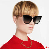 Close-up detail view of Louis Vuitton unisex sunglasses