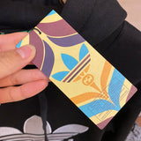 Close-up detail shot of Gucci luxury clothing with label-forward styling