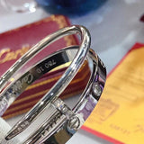 Angled view of Cartier unisex jewelry piece