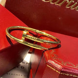 Angled view of Cartier unisex jewelry piece