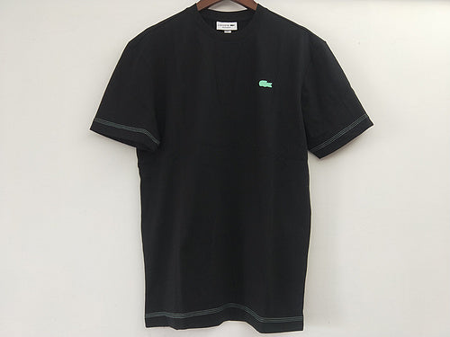 Front view of Lacoste luxury clothing with tailored silhouette