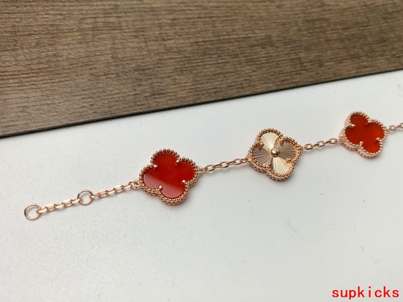 Lifestyle view of Van Cleef & Arpels unisex jewelry piece