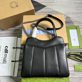 Styled lifestyle shot of statement classic women's handbag – women's luxury accessory