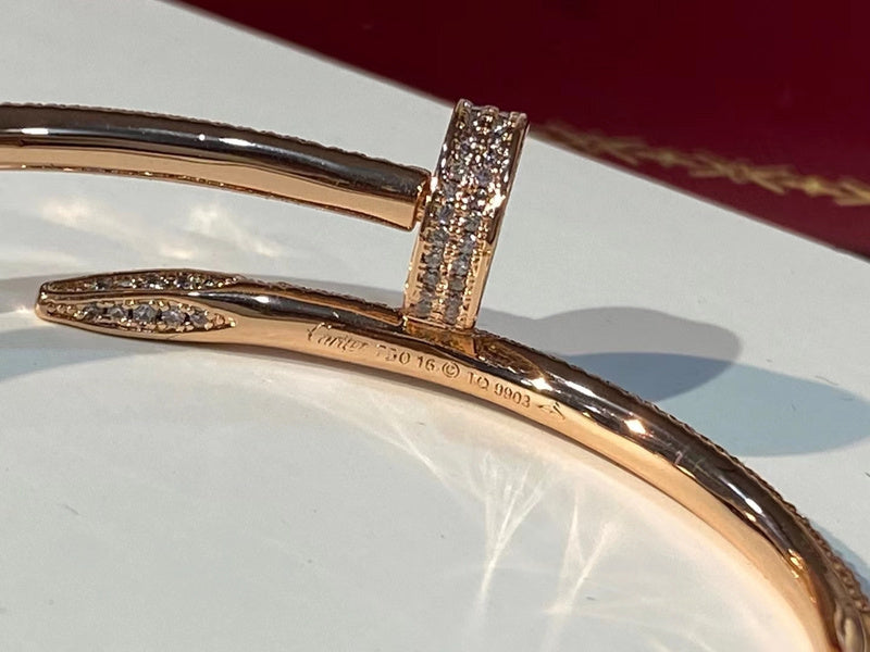 Close-up detail view of Cartier unisex jewelry piece