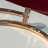 Close-up detail view of Cartier unisex jewelry piece