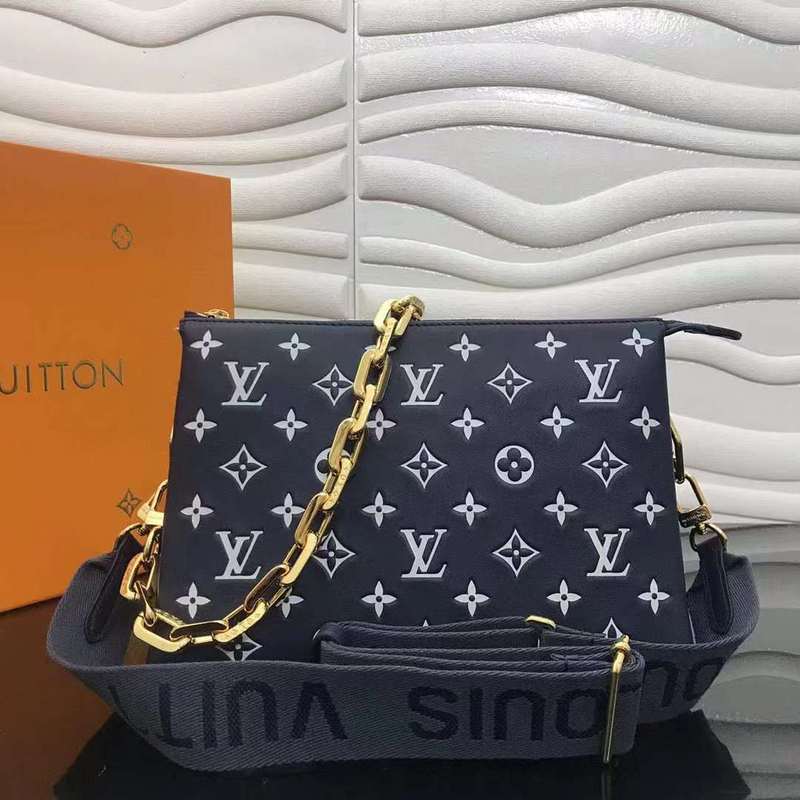Side profile of structured signature women's handbag – women's luxury handbag