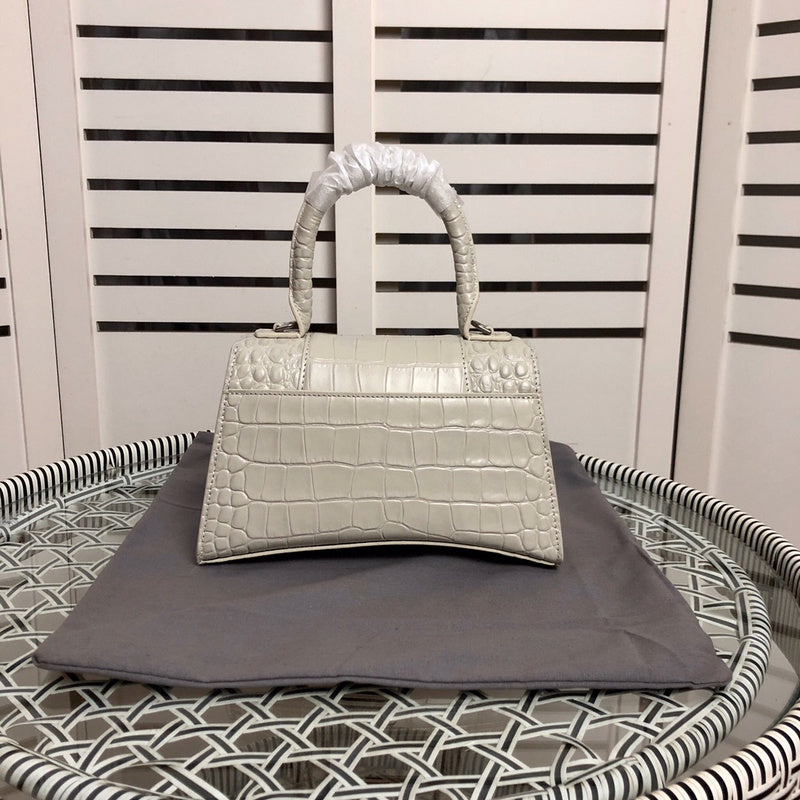 Close-up detail of modern polished women's handbag – women's designer-style accessory