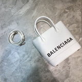Statement Vegan Leather Handbag - Refined Silhouette | Women's Statement Accessory #915 - front view (image 1) of designer-inspired handbag