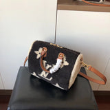 Front view of signature premium women's handbag – women's statement bag