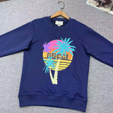 Front view of Gucci luxury clothing with signature branding