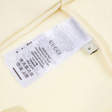 Close-up detail shot of Gucci luxury clothing with relaxed-fit cut