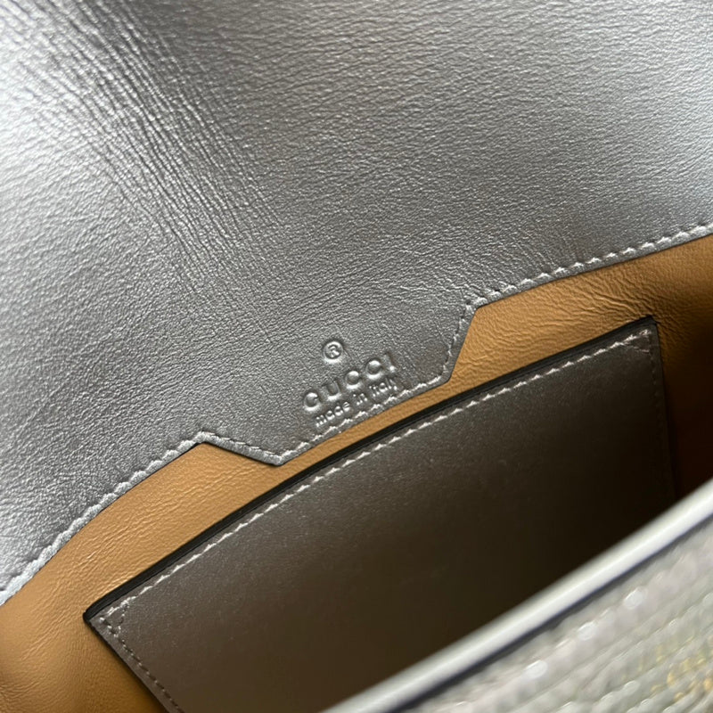 Close-up detail of modern classic women's handbag – women's designer-style accessory