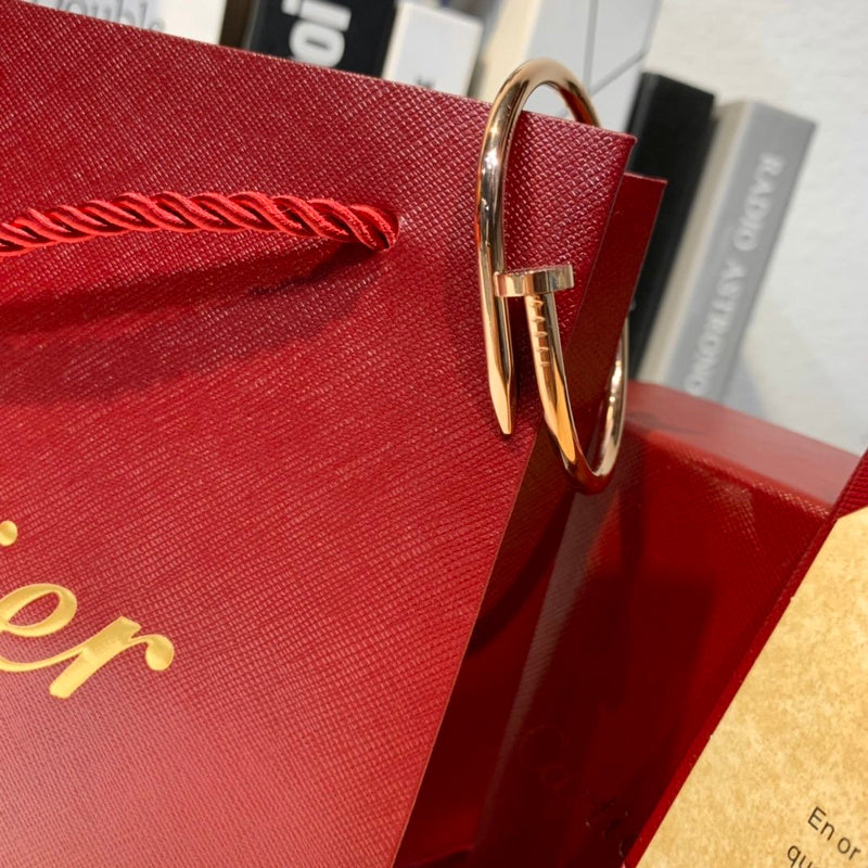 Front view of Cartier unisex jewelry piece