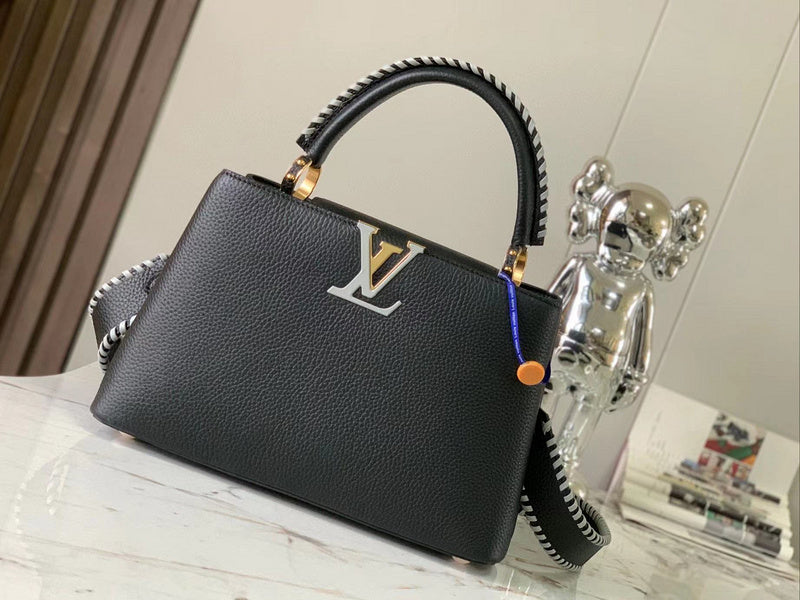 Side profile of everyday-luxe signature women's handbag – women's luxury handbag
