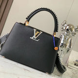 Side profile of everyday-luxe signature women's handbag – women's luxury handbag