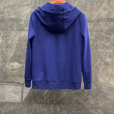Full styled look of Louis Vuitton luxury clothing with monogram-inspired silhouette