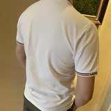 Back view of Moncler luxury clothing with tailored silhouette