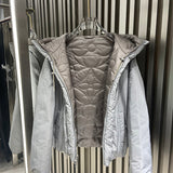 Side profile of Louis Vuitton luxury clothing with logo-detail design