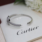 Close-up detail view of Cartier unisex jewelry piece