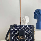 Side profile of everyday-luxe structured women's handbag – women's statement bag