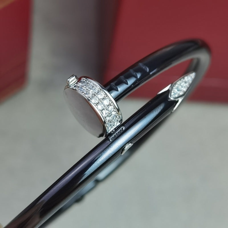 Close-up detail view of Cartier unisex jewelry piece