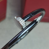 Close-up detail view of Cartier unisex jewelry piece