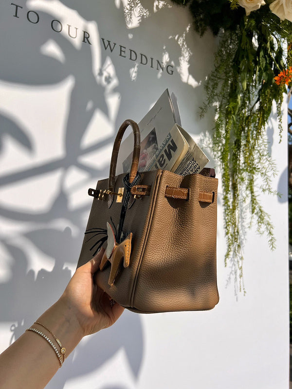 Side view of statement structured handbag