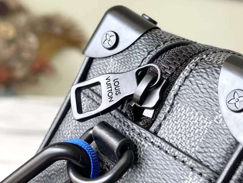 Back view of chic signature women's handbag – women's luxury handbag