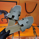 Hermès Camel Flat Thong Sandals - Sole Detail View