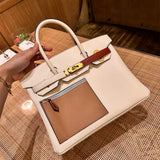  Signature tote bag carried on shoulder