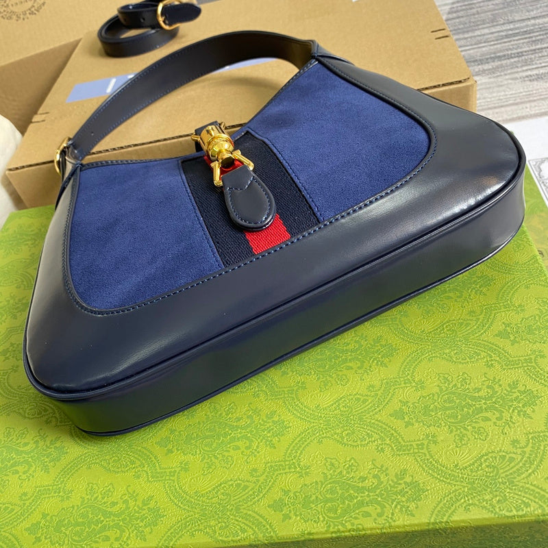 Styled lifestyle shot of polished signature women's handbag – women's designer-style accessory