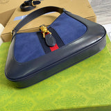 Styled lifestyle shot of polished signature women's handbag – women's designer-style accessory