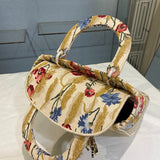 Front view of signature chic women's handbag – women's designer-style accessory