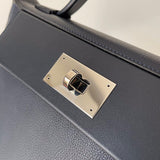 Side view of graceful structured handbag