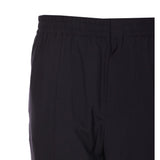 Close-up of Bottega Veneta pants hardware and fine stitching