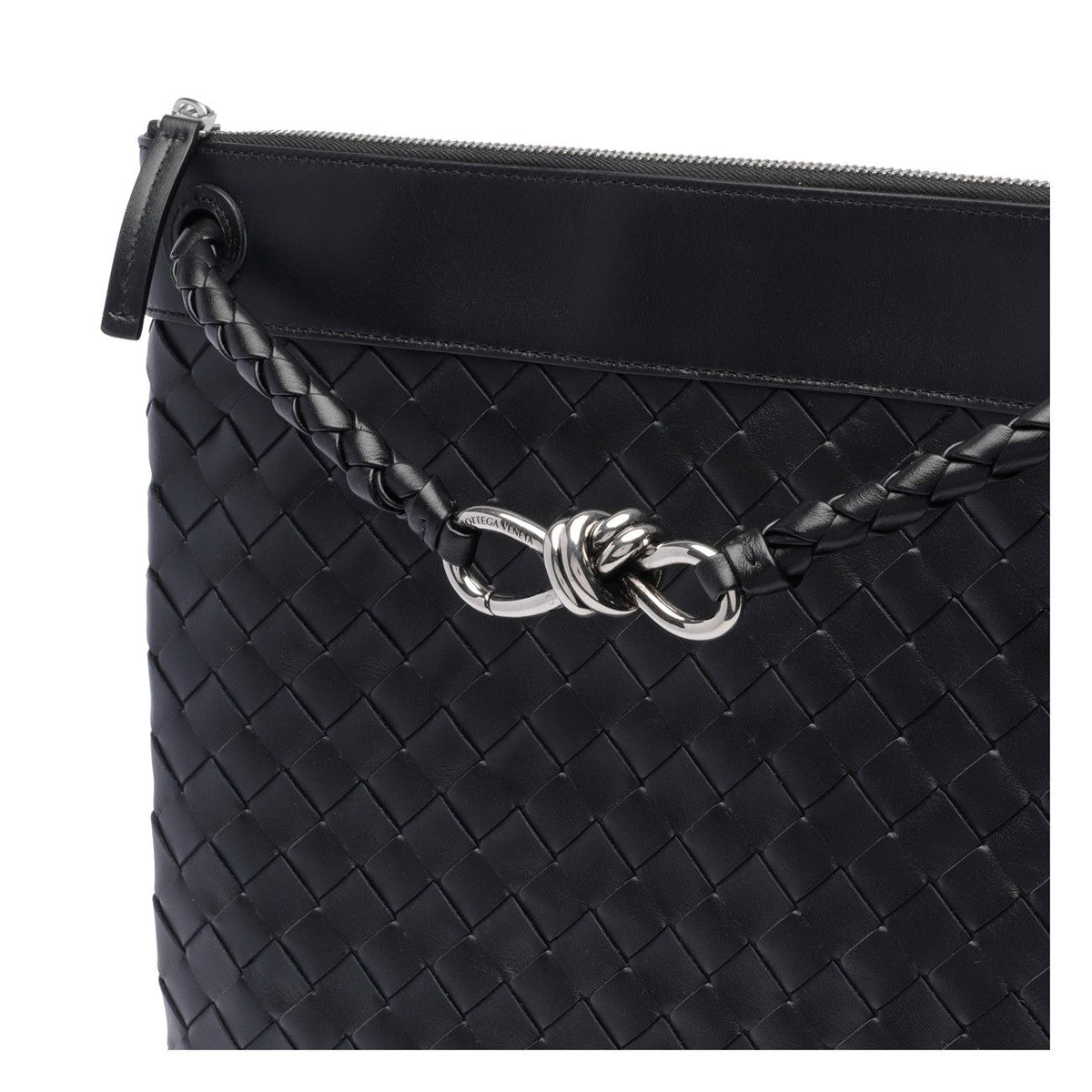 Close-up of Bottega Veneta cross body bags hardware and fine stitching