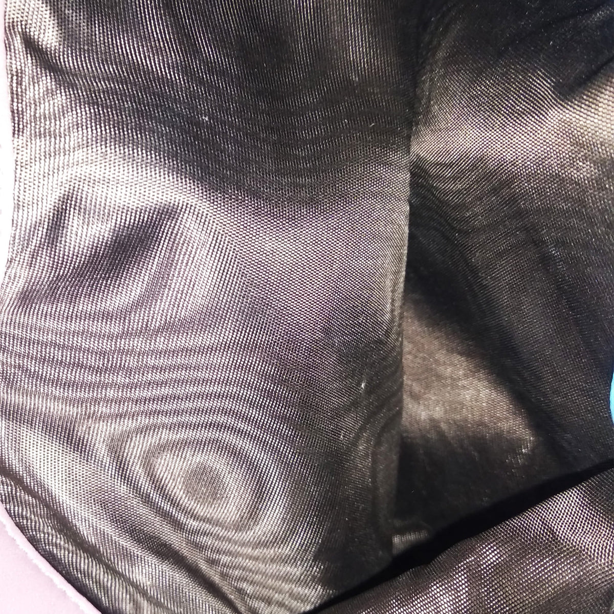 Close-up of G bags hardware and fine stitching