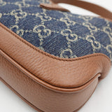 Close-up of GG bags hardware and fine stitching