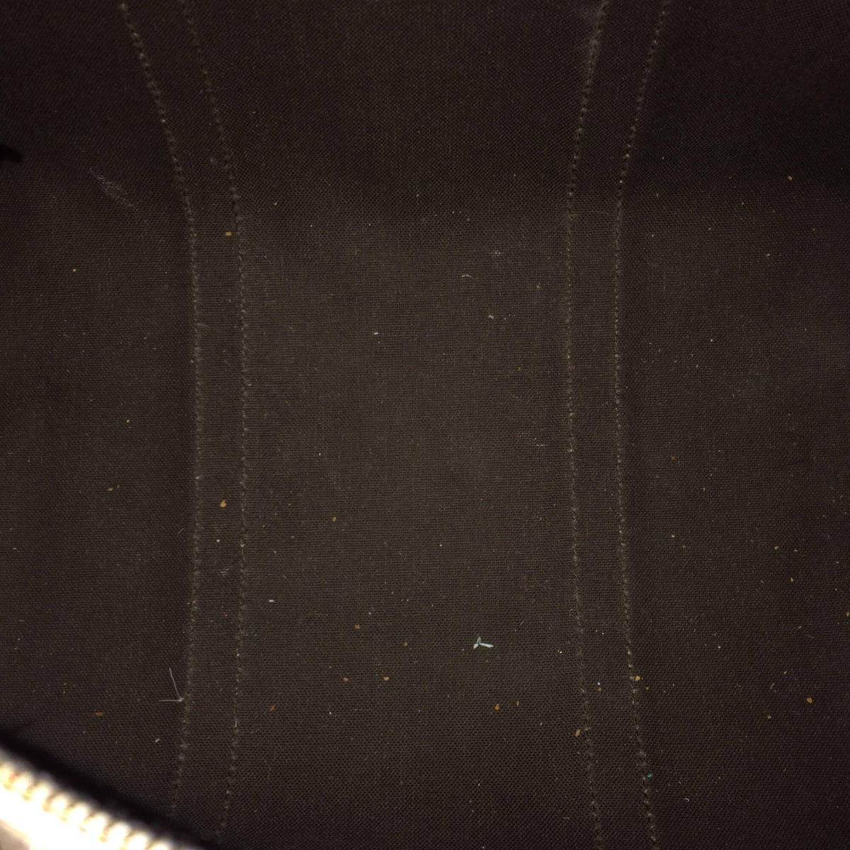 Close-up of Joy bags hardware and fine stitching