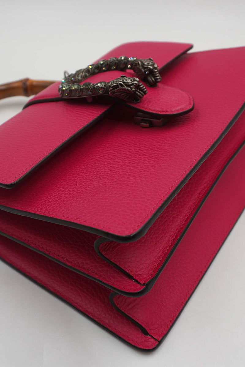 Close-up of Medium bags hardware and fine stitching