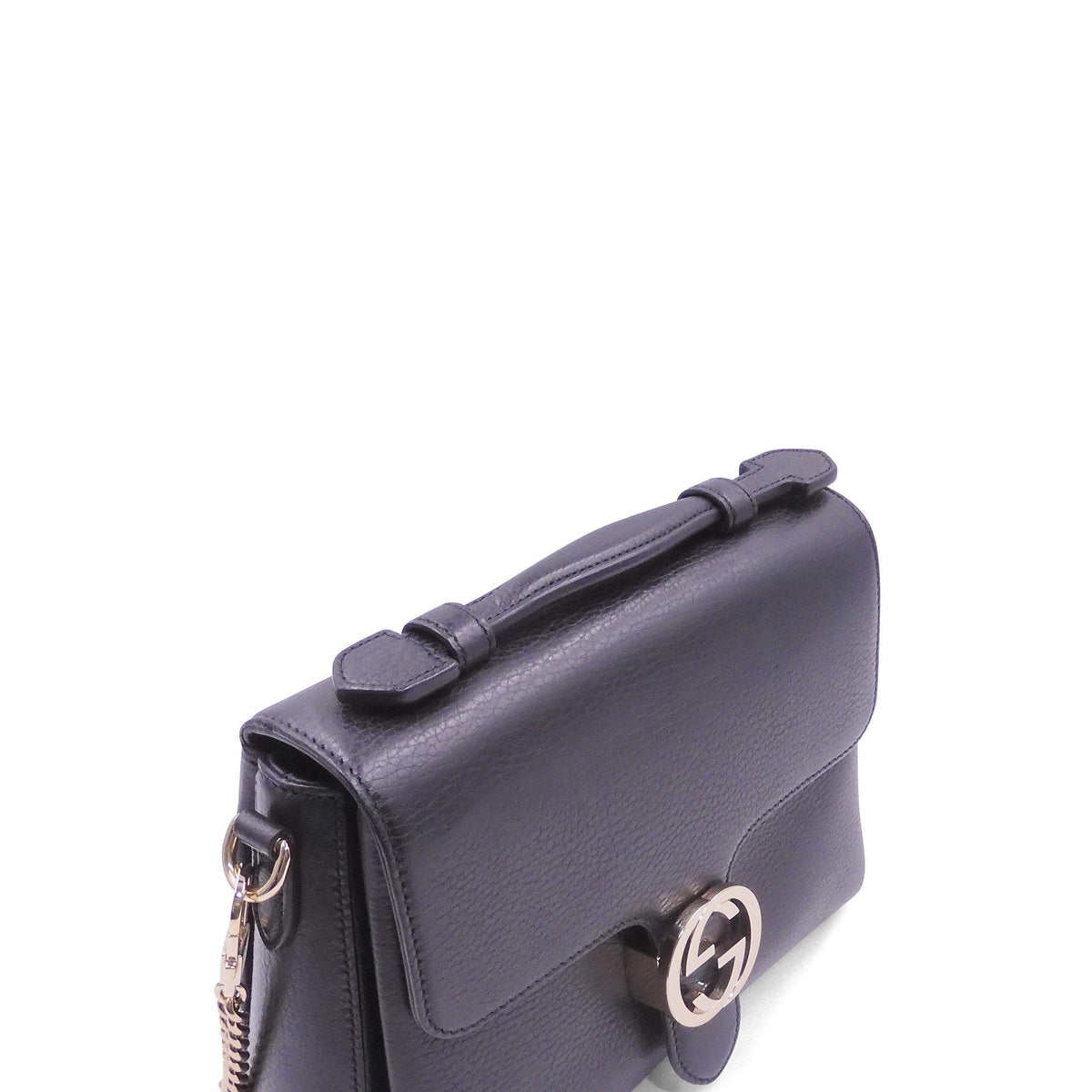Close-up of Interlocking bags hardware and fine stitching