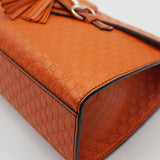 Close-up of Gucci bags hardware and fine stitching