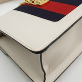 Close-up of Mini bags hardware and fine stitching