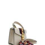 Close-up of Mini bags hardware and fine stitching