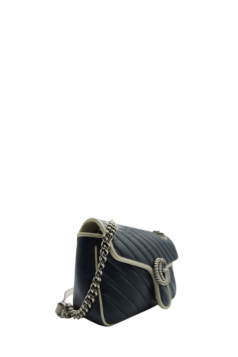 Close-up of GG bags hardware and fine stitching