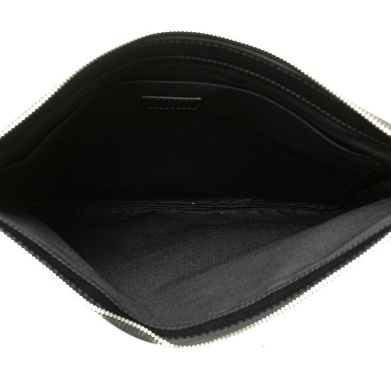 Balenciaga designer clutch leather closeup detail